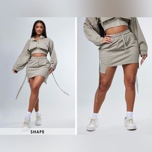 PRETTYLITTLETHING Shape Moss Grey Sweat Pocket Tie Detail Drawstring Mini Skirt